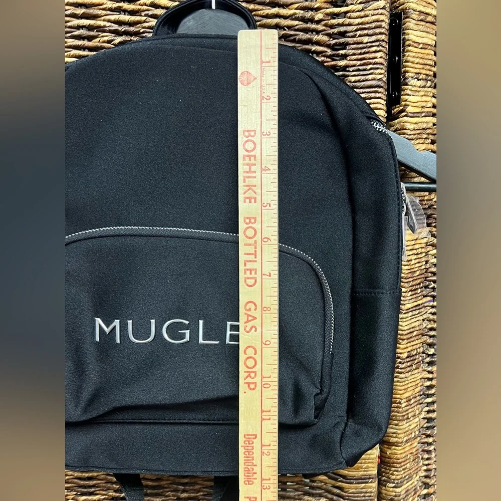 Mugler - Black Backpack- New, plastic over‎ two zippers, Apprx: 11”x13”